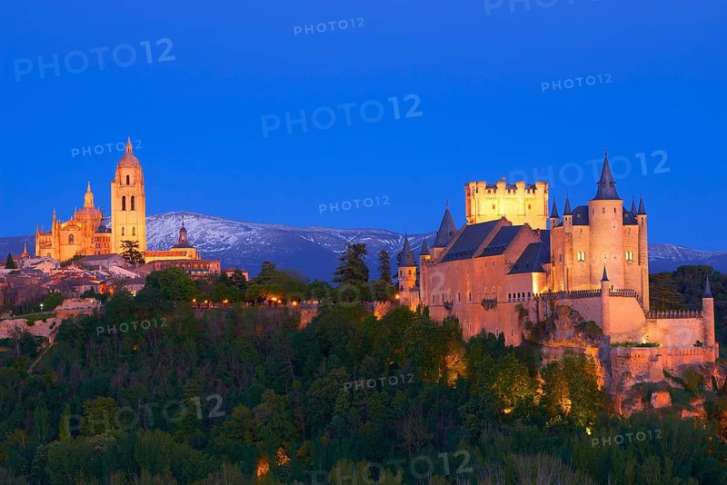 Alcazar fortress and cathedral at dusk