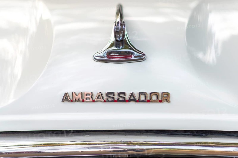 Emblem on a white Ambassador