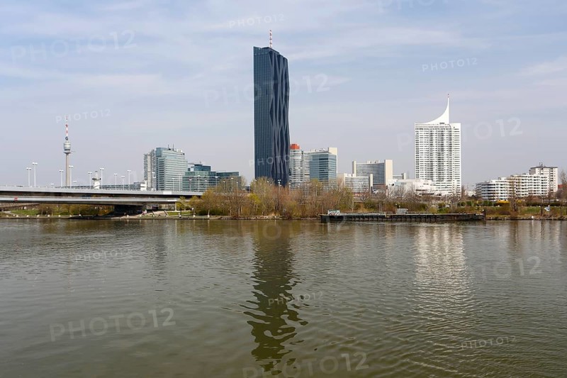 Donauturm or Danube Tower and Kaisermuhlen district with UNO City