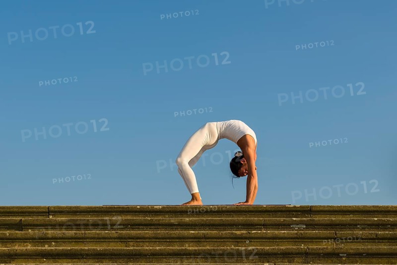 Young woman practising Hatha yoga