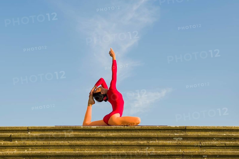 Young woman practising Hatha yoga