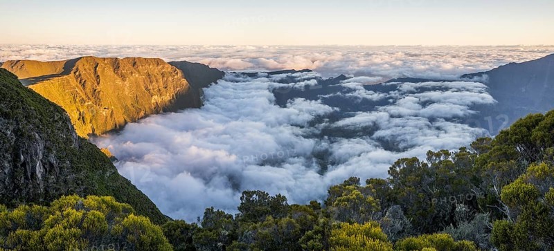 Sunset above sea of clouds at Cilaos basin