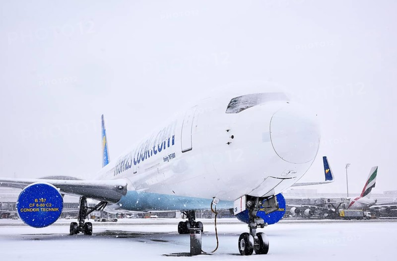 Condor Boeing B 767-300 aircraft in parking position in the snow