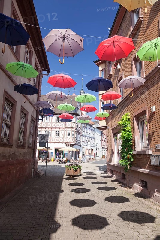 Altstadtgasse with colorful umbrellas
