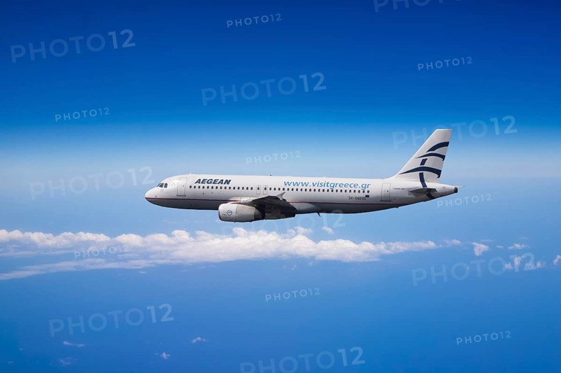 SX-DGD Aegean Airlines Airbus A320-232 in flight over the Mediterranean Sea