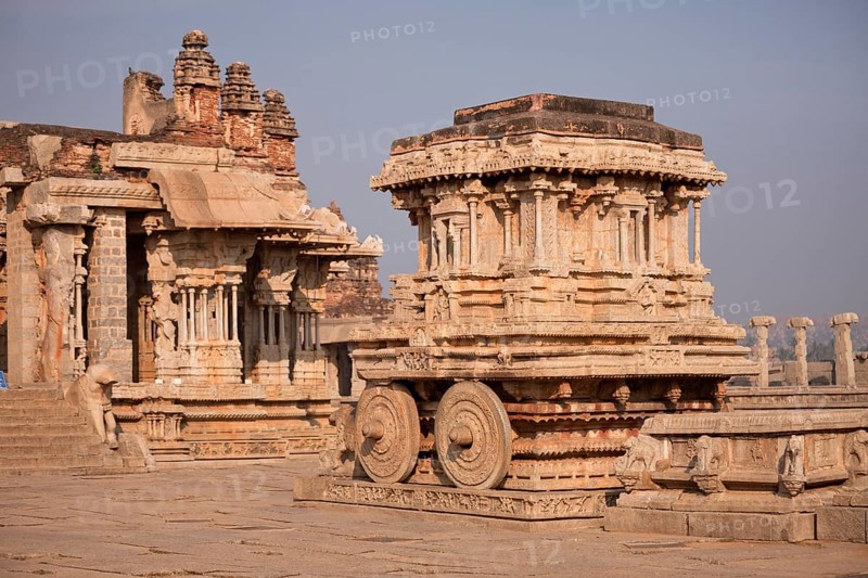 Garuda shrine as stone temple car or Ratha in front of Vitthala Temple
