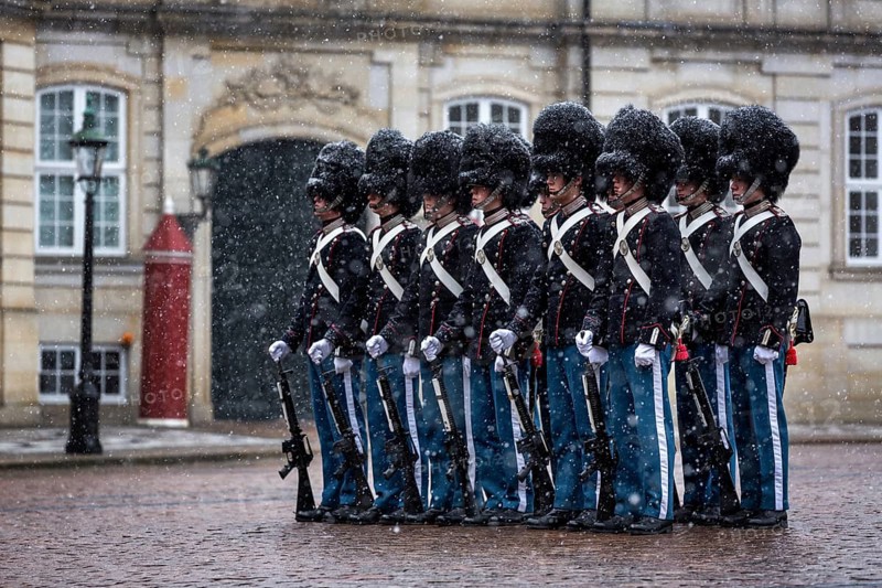 Royal Life Guards standing in snow in front of Amalienborg Palace