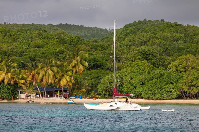 Beach with sailing boat