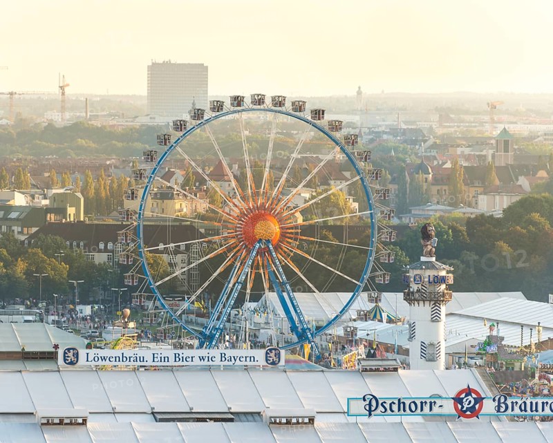 Ferris wheel with Lowenbrau tower