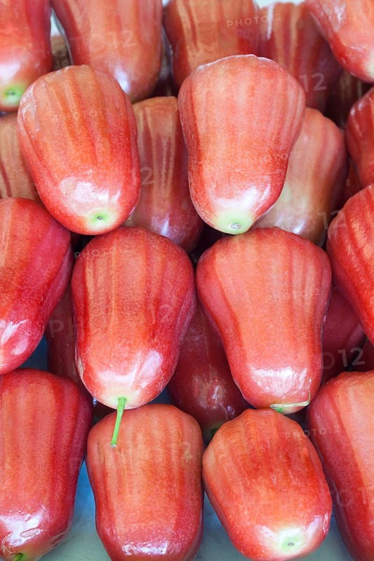 Rose apples on sale at a market