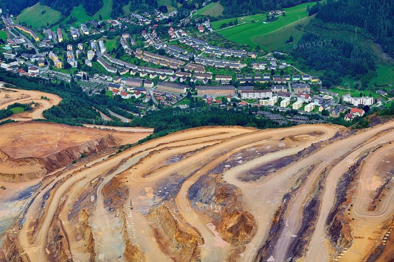 Open pit ore mining and workers' settlements