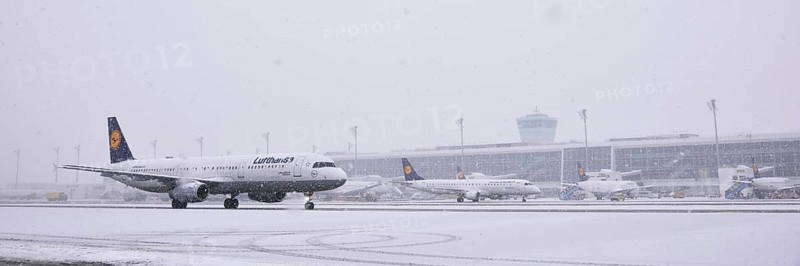 Lufthansa Airbus A321-200 aircraft rolling on the run during snowfall