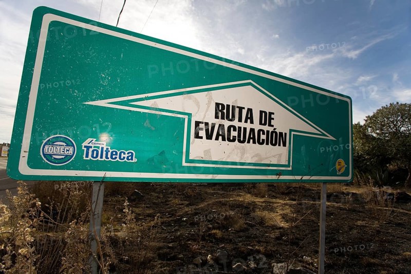 Evacuation sign in a village near the volcano Popocatepetl