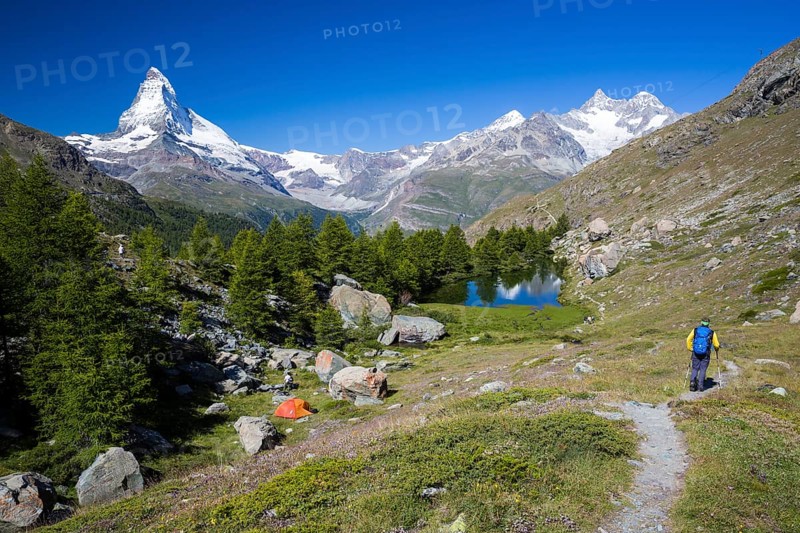 Hiker and a wild camper at Grindjisee lake