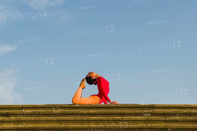 Young woman practising Hatha yoga