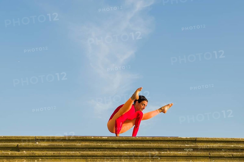 Young woman practising Hatha yoga