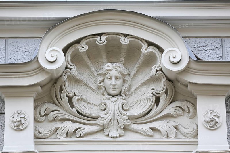Head of a Woman in a shell above the entrance