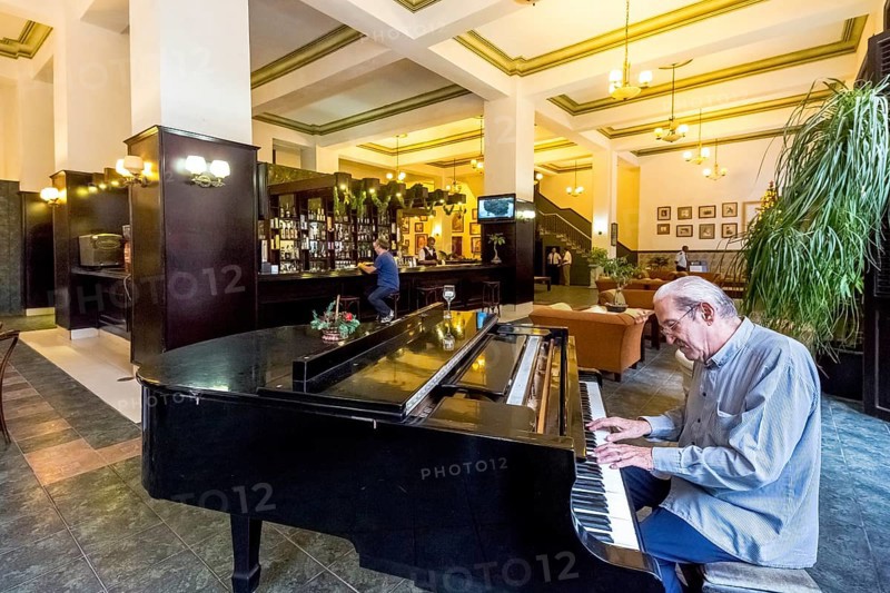 Hotel lobby with a piano player
