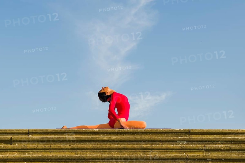 Young woman practising Hatha yoga