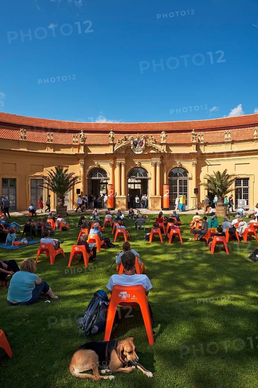 Audience at the annual Poetry Festival in the Castle Garden in front of the Orangery