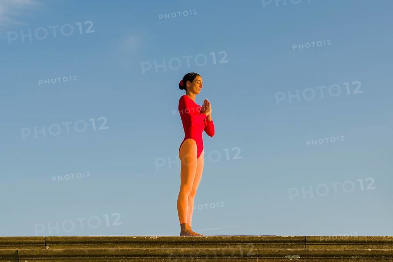 Young woman practising Hatha yoga