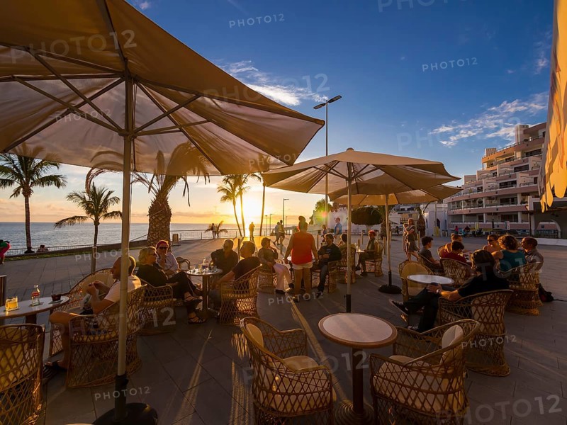 Beach promenade with restaurants in the evening
