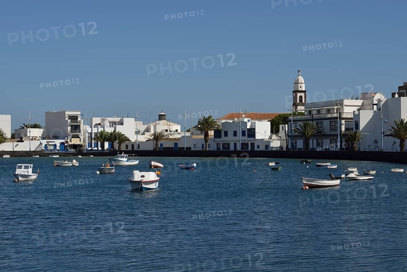 Redesigned harbour of El Charco de San Gines with the church Iglesia de San Gines
