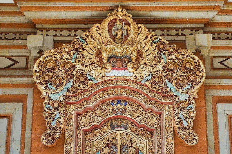 Wooden door decorated with carvings