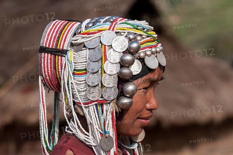 Elderly woman of the Akha ethnic group with traditional headdress