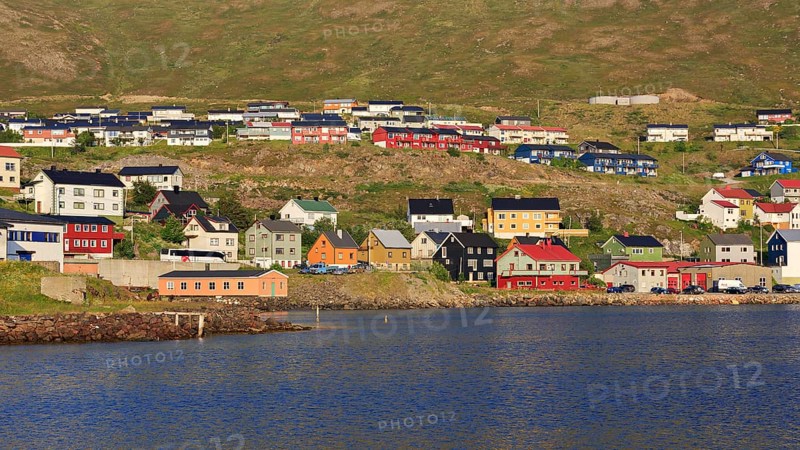 Colorful wooden houses on Porsangerfjord
