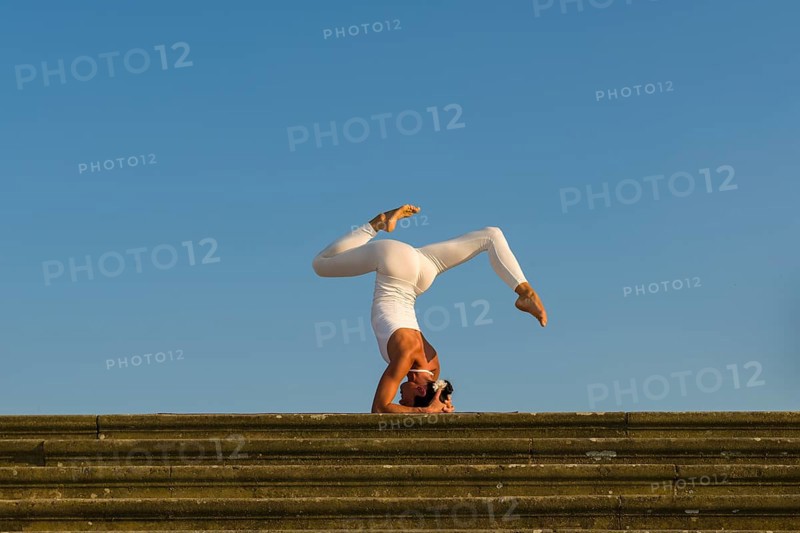 Young woman practising Hatha yoga