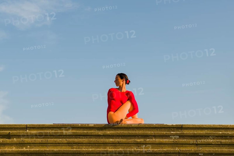 Young woman practising Hatha yoga