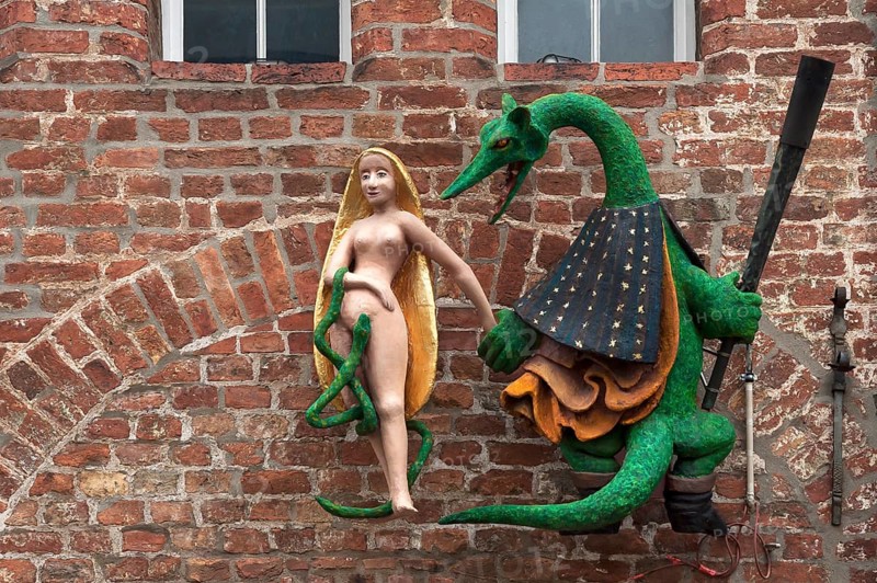 Figures of a dragon and a woman on the facade of the former Hieronymus Restaurant & Cafe