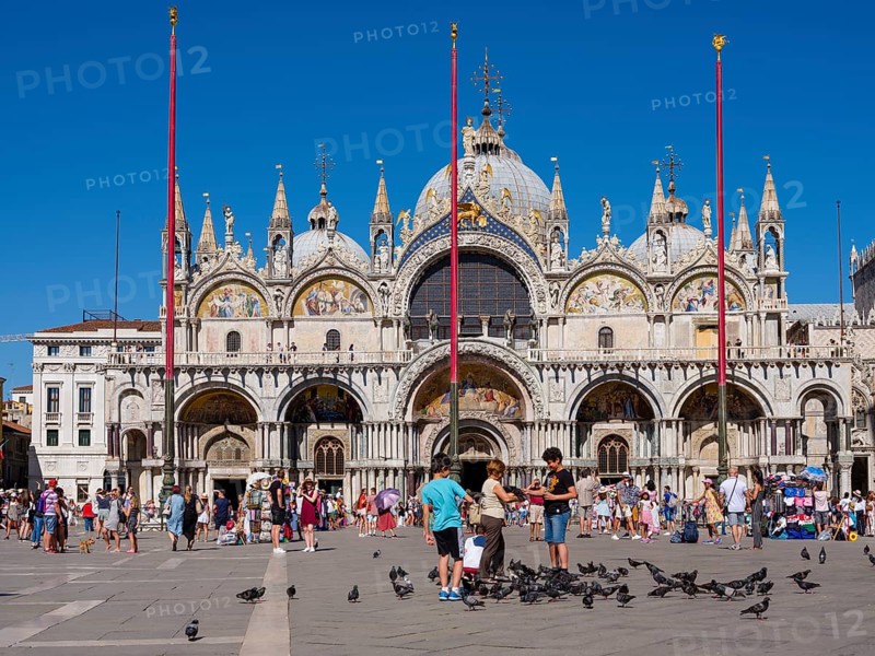 Basilica St. Mark in St. Mark's Square filled with tourists