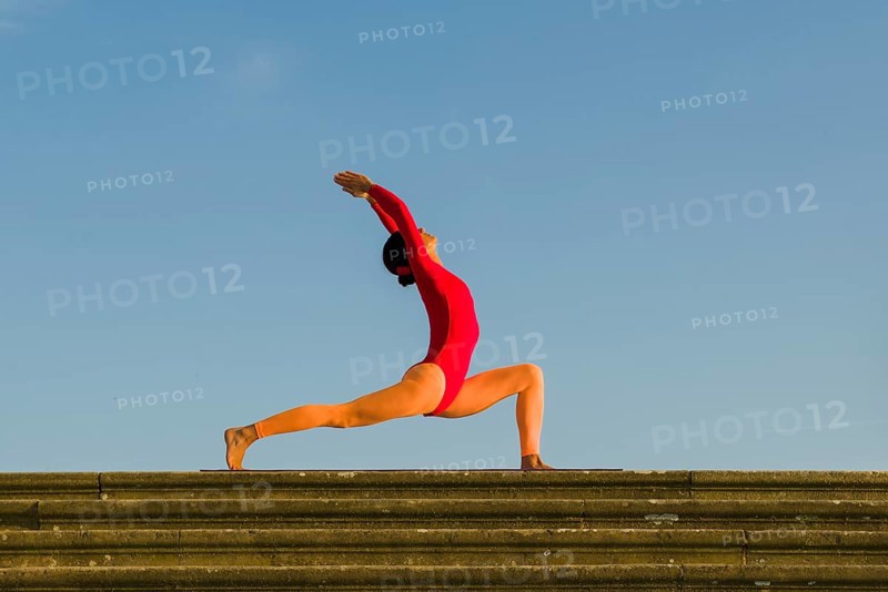 Young woman practising Hatha yoga