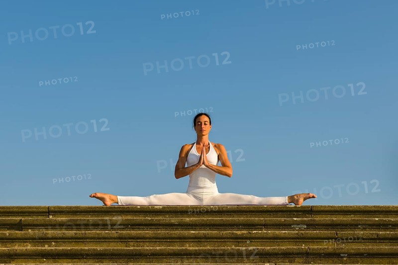 Young woman practising Hatha yoga