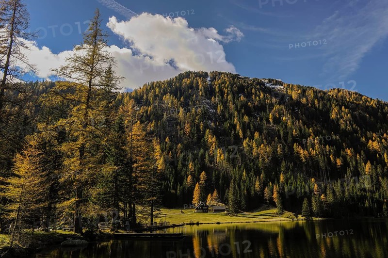 House at Etrachsee Lake in autumn