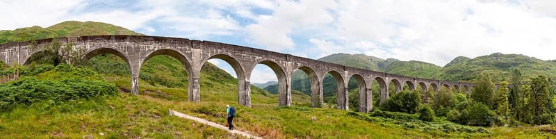 Hiker under Glenfinnan Viaduct