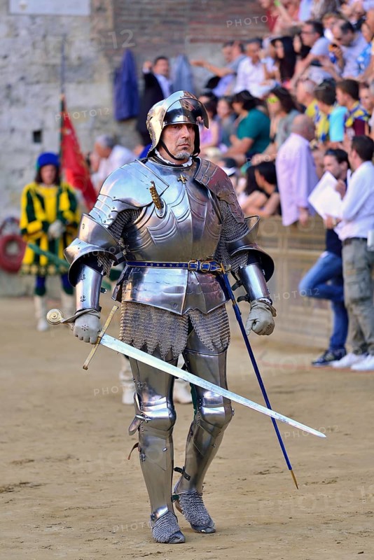Knight in armor at the parade before the historical horse race Palio di Siena