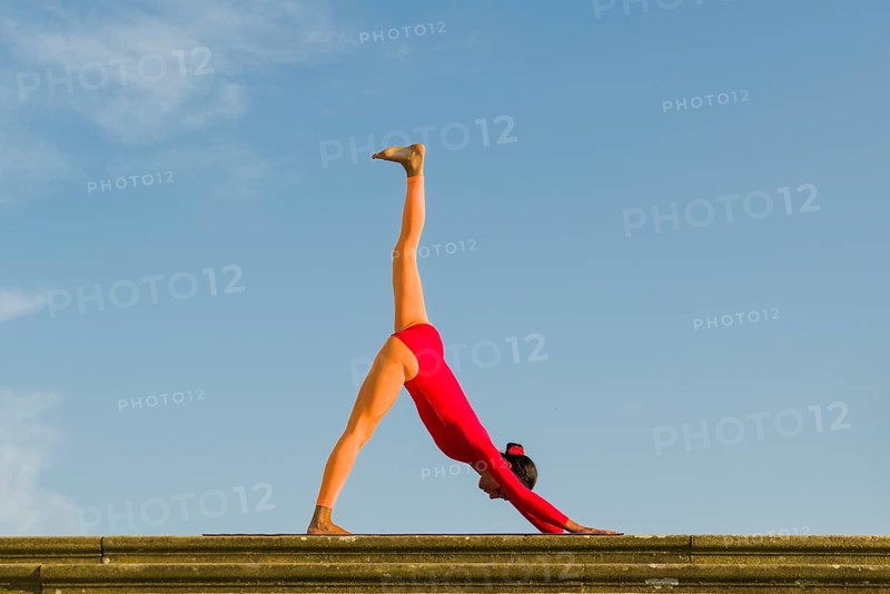 Young woman practising Hatha yoga