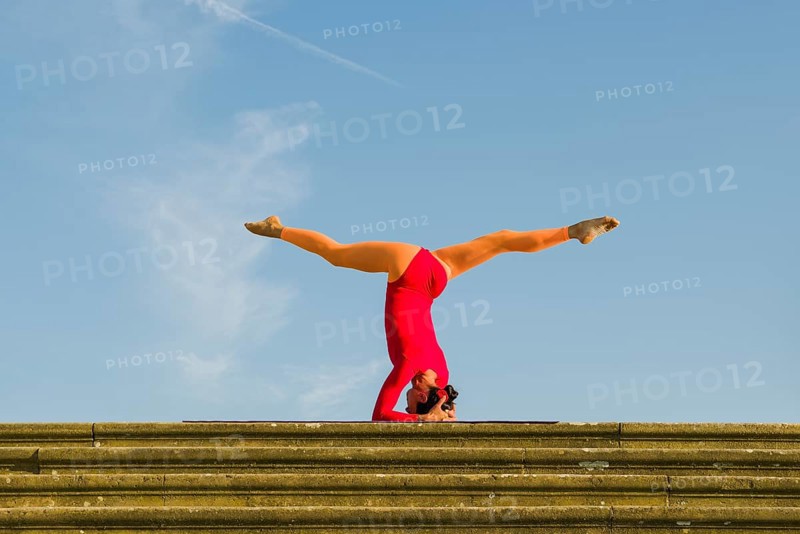 Young woman practising Hatha yoga