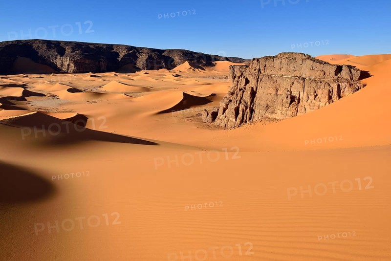 The sand dunes and rocks of Moul Naga