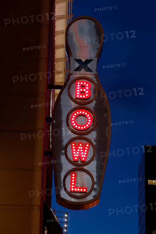 Neon light in the shape of a bowling pin