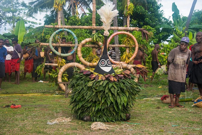 Traditional masked man at a Taboo death ceremony