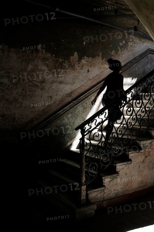 Woman walking up stairs