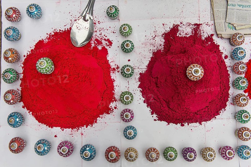Piles of red Kum Kum powder or Kumkuma