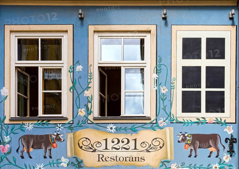 Painted house facade in the old town Vecriga