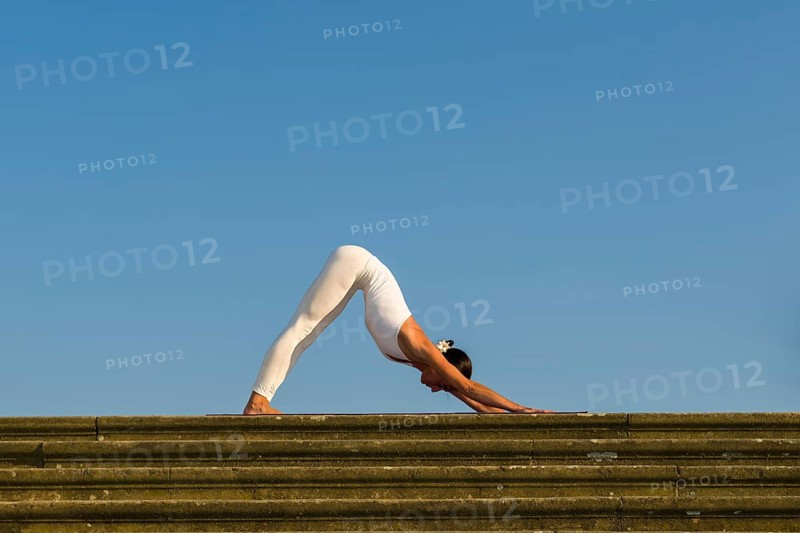 Young woman practising Hatha yoga