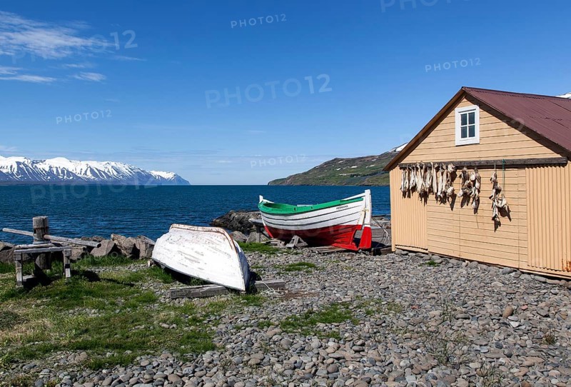 Fisherman's hut with boats and the sea