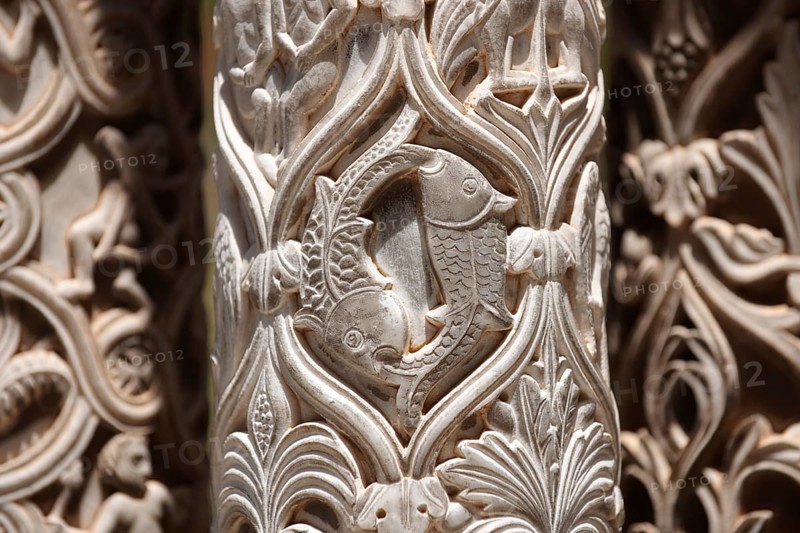 Sculpted Christian fish symbols in the medieval columns of the cloisters of Monreale Cathedral